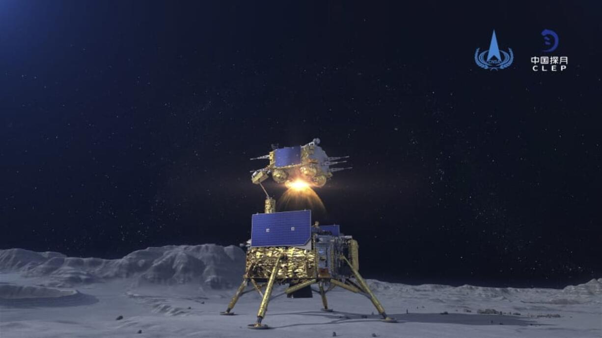 In this China National Space Administration (CNSA) photo released by Xinhua News Agency, a simulated image of the ascender of Chang&#039;e-5 spacecraft blasting off from the lunar surface at the Beijing Aerospace Control Center (BACC) in Beijing on Dec. 3, 2020. The Chinese lunar probe lifted off from the moon Thursday night with a cargo of lunar samples on the first stage of its return to Earth, state media reported.