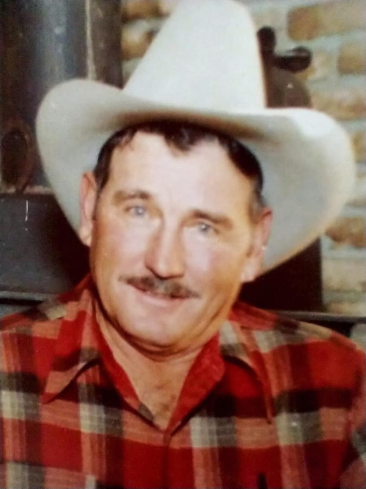 This family photo provided by Brett Woolley shows his father, Dan Woolley, in the fall of 1978 at the family&#039;s home on a ranch near Clayton, Idaho. In September 1980, Brett Woolley&#039;s dad was shot in the parking lot of a small town bar deep in the Idaho mountains. Then the shooter crossed the street to the only other bar in town, ordered a drink and declared, &quot;I just killed a man,&quot; and disappeared into the night. As days turned into years, Woolley accepted the likelihood that his father&#039;s murderer would never be found. But all that changed in the fall of 2019 when authorities arrested a former pro rodeo rider named Water Mason in a small Texas village.