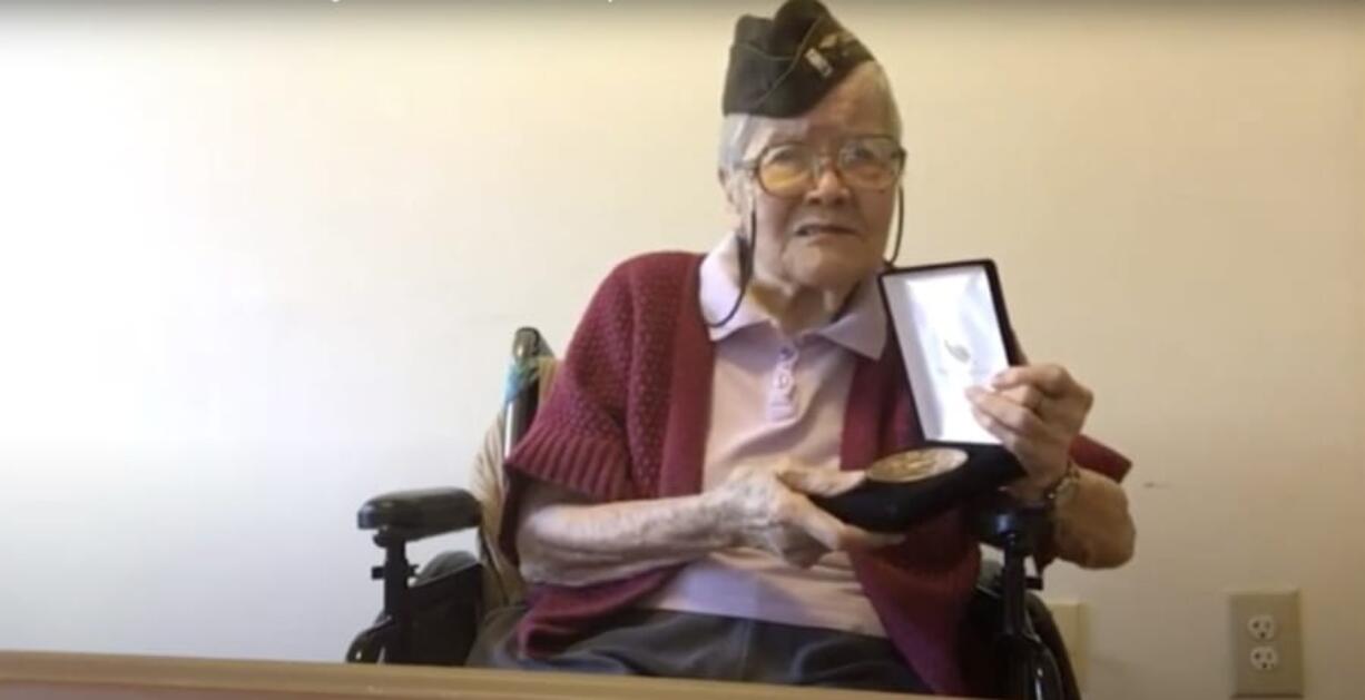 In this image from House Television video, 1st Lt. Elsie Chin Yuen Seetoo, accepts a Congressional Gold Medal during a virtual ceremony broadcast from Capitol Hill in Washington, Wednesday, Dec. 9, 2020.