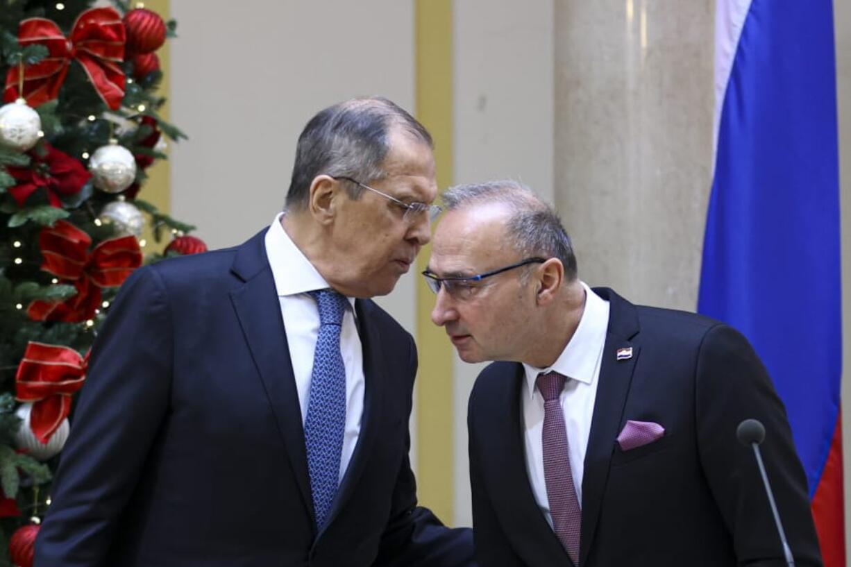 In this photo released by Russian Foreign Ministry Press Service, Russian Foreign Minister Sergey Lavrov, left, speaks to Croatia&#039;s Foreign Minister Gordan Grlic Radman, during their joint news conference following the talks in Zagreb, Croatia, Wednesday, Dec. 16, 2020.