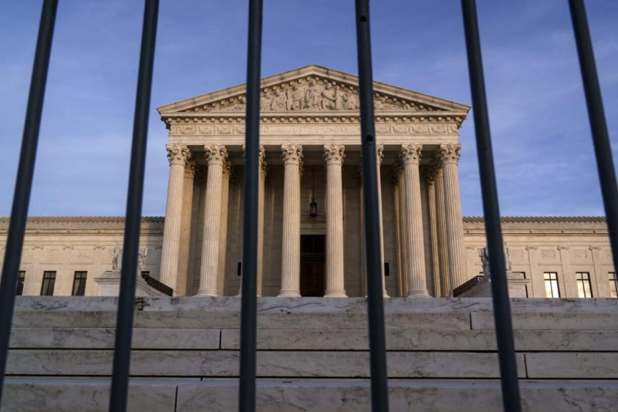 In this Nov. 5, 2020, file photo, the Supreme Court in Washington. The Supreme Court has rejected Republicans&#039; last-gasp bid to reverse Pennsylvania&#039;s certification of President-elect Joe Biden&#039;s victory in the electoral battleground. The court without comment Tuesday, Dec. 8, refused to call into question the certification process in Pennsylvania. (AP Photo/J.