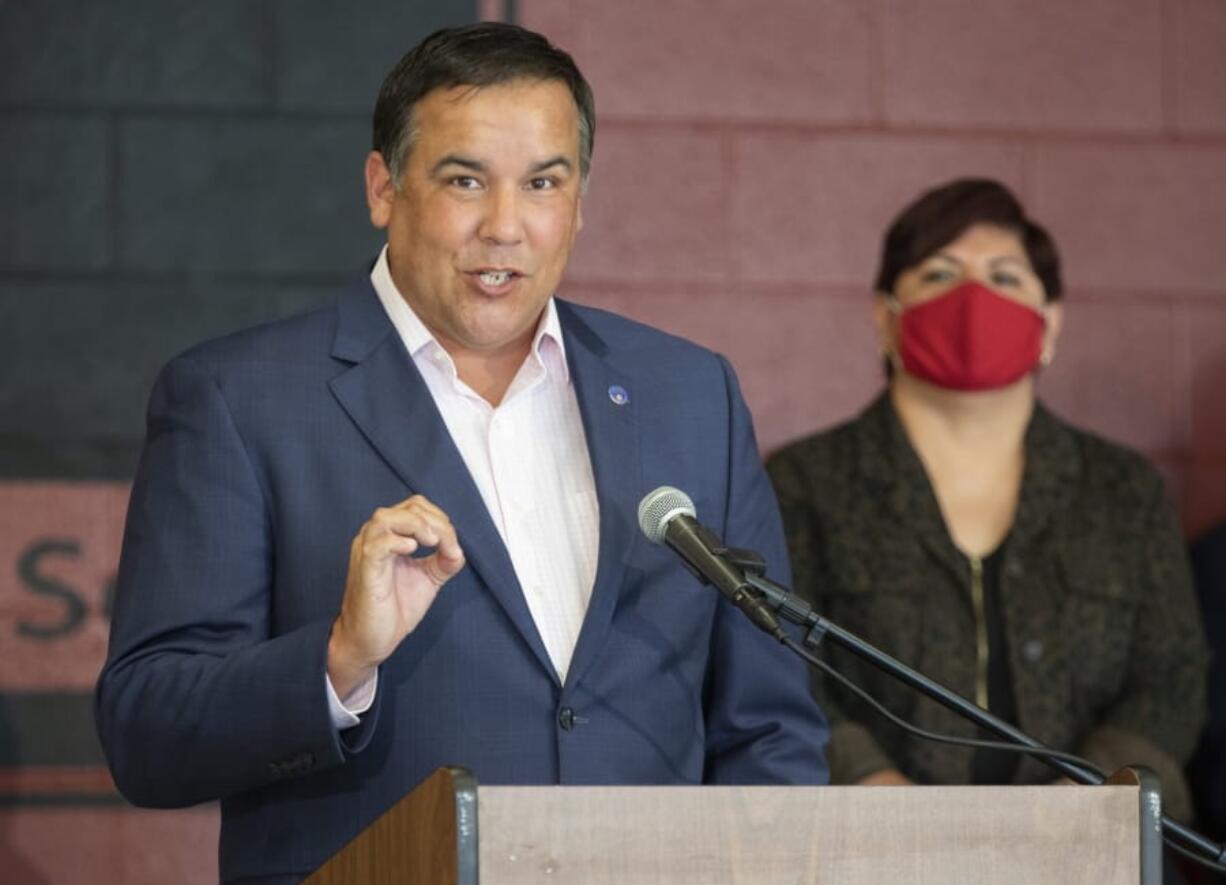 FILE - In this Tuesday, July 28, 2020 file photo, Columbus Mayor Andrew Ginther makes remarks following the announcement by Columbus City Schools superintendent Talisa Dixon that all students would start the 2020-21 school year online during a news conference at Downtown High School in Columbus, Ohio. The mayor of Ohio&#039;s capital city says an officer who shot and killed a Black man holding a cell phone early Tuesday, Dec. 22, 2020 morning did not activate his body camera beforehand.