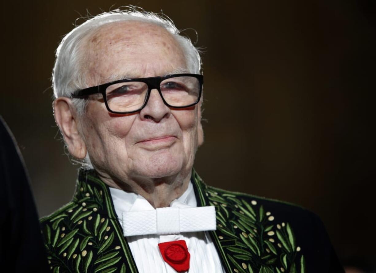 FILE - In this Nov. 30, 2016, file photo, French fashion designer Pierre Cardin acknowledges applause after a show to mark 70 years of his creations, in Paris. France&#039;s Academy of Fine Arts says famed fashion designer Pierre Cardin has died at 98.