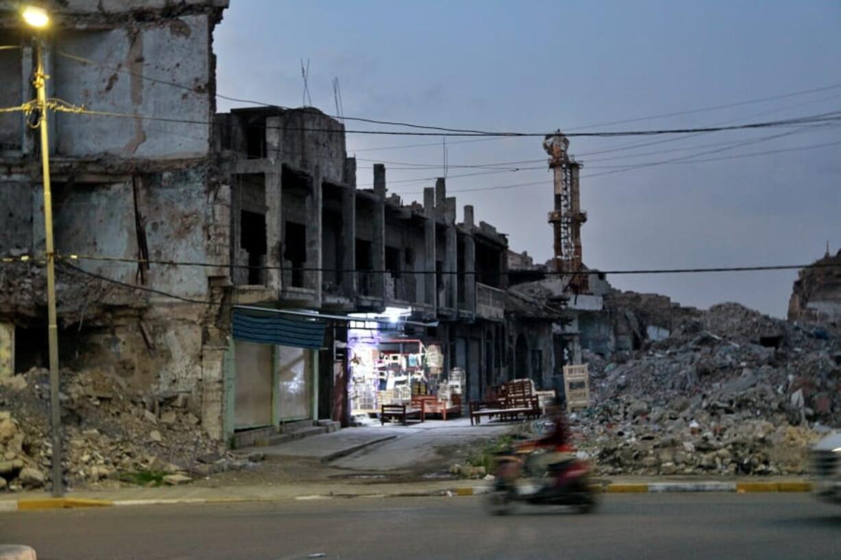 Mounds of rubble, remnants of the battle to retake the city three years ago from the Islamic State group, remain in the Old City of Mosul, Iraq Sunday, Nov. 29, 2020. Local officials say Baghdad&#039;s cash-strapped government, struggling with a dire economic crisis fueled by low oil prices and the coronavirus, doesn&#039;t have the funds to launch serious reconstruction efforts.