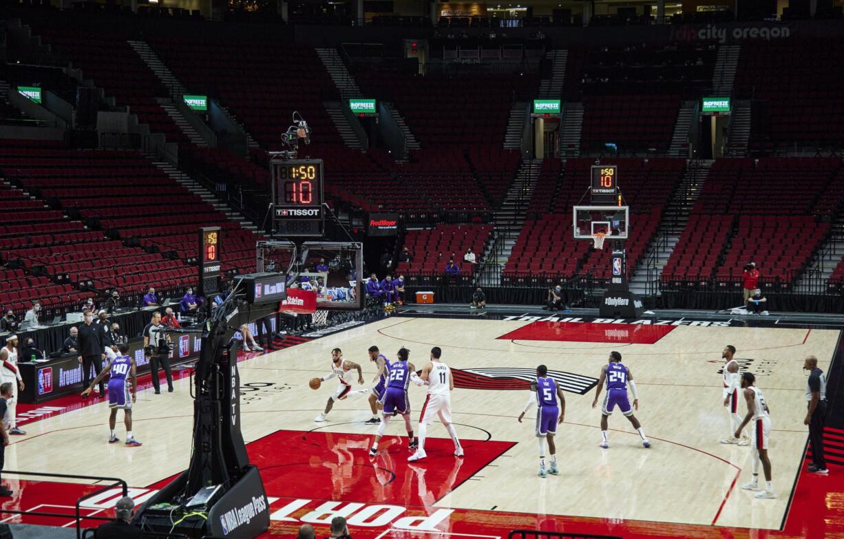 Portland Trail Blazers guard Gary Trent Jr. drives to the basket against the Sacramento Kings in an empty Moda Center during the first half of a preseason NBA basketball game in Portland, Ore., Friday, Dec. 11, 2020.