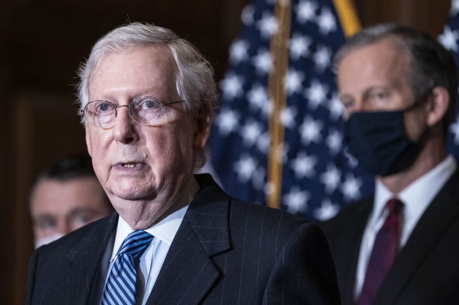 Senate Majority Leader Mitch McConnell of Kentucky, speaks during a news conference following a weekly meeting with the Senate Republican caucus, Tuesday, Dec. 8. 2020  at the Capitol in Washington.