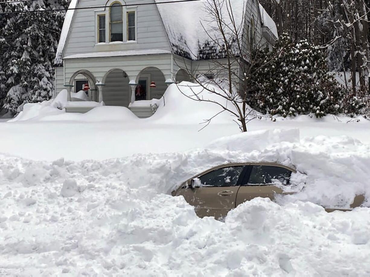 This photo, provided by the New York State Police, shows a car, in Oswego, NY, from which a New York State Police sergeant rescued Kevin Kresen, 58, of Candor, NY, stranded for 10 hours, covered by nearly 4 feet of snow thrown by a plow during this week&#039;s storm.  Authorities say the New York State Police sergeant rescued Kresen stranded for hours in a car covered by nearly 4 feet of snow thrown by a plow during this week&#039;s storm. The 58-year-old Candor man drove off the road and got plowed in by a truck.