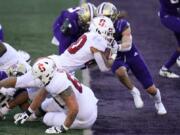 Stanford running back Austin Jones dives into the end zone on a touchdown run against Washington in the first half of an NCAA college football game Saturday, Dec. 5, 2020, in Seattle.