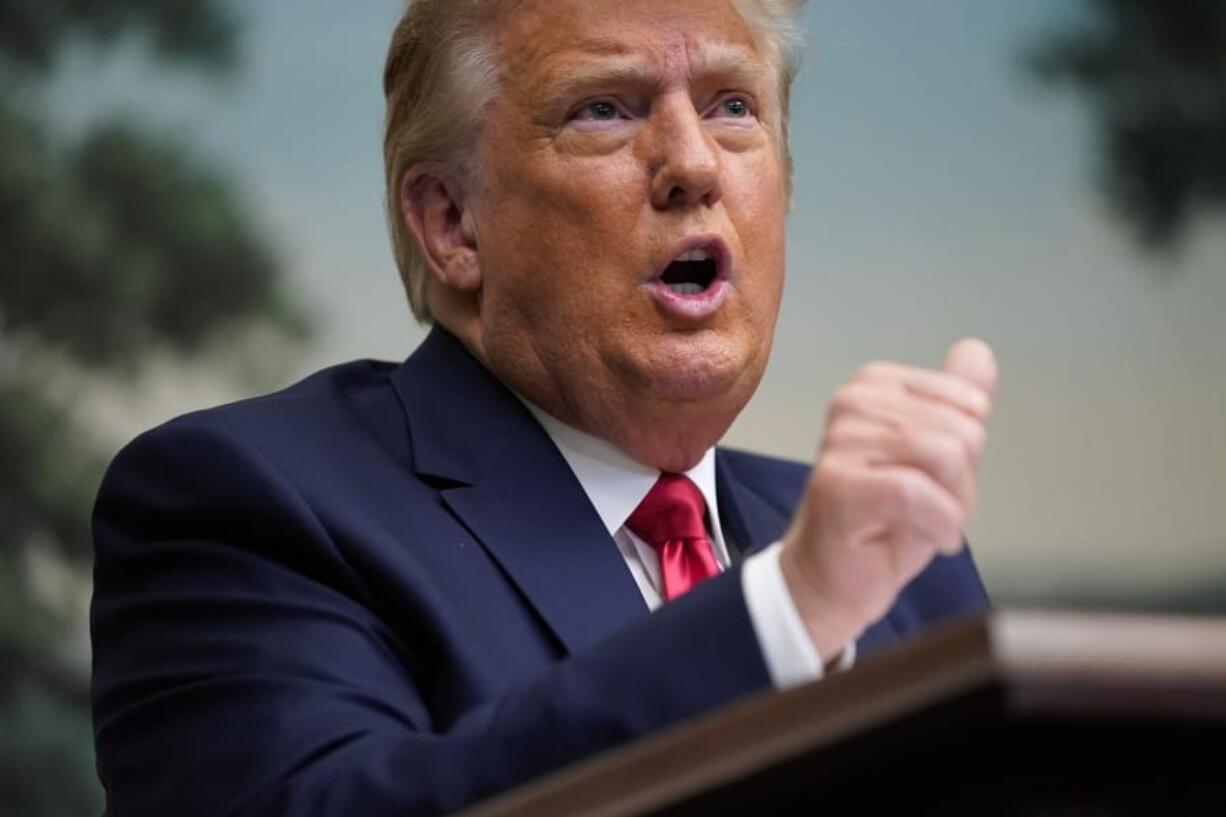 President Donald Trump speaks with reporters on Nov. 26.