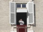 Pope Francis delivers the Angelus noon prayer in St. Peter&#039;s Square at the Vatican, Sunday, Dec. 20, 2020.