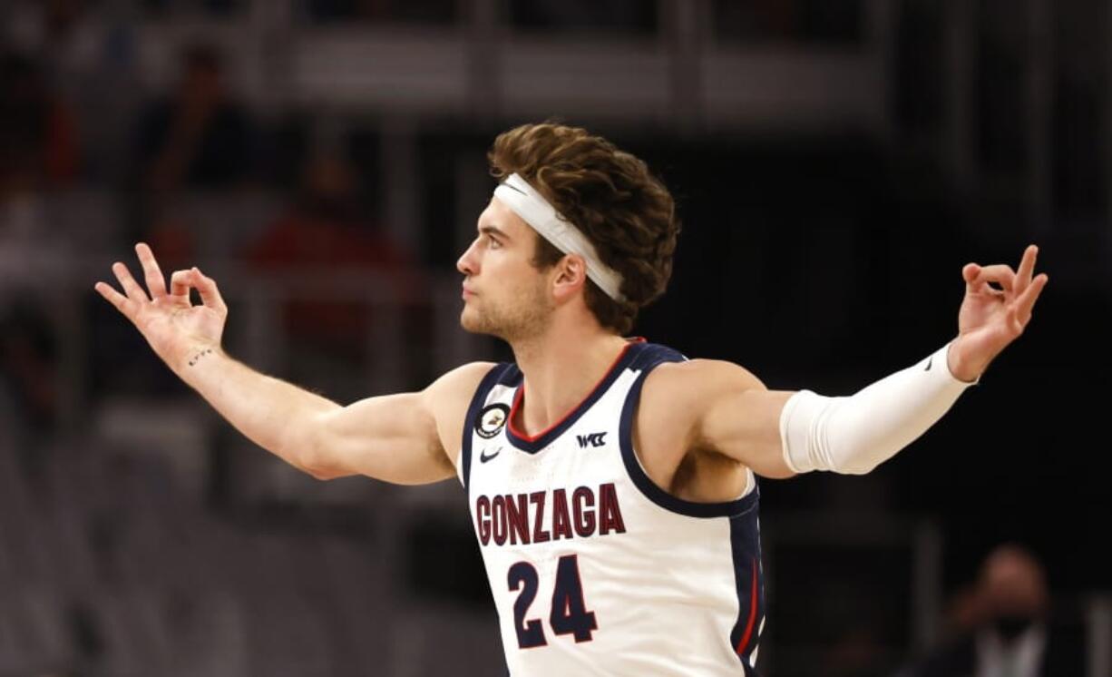 Gonzaga forward Corey Kispert (24) reacts after making a 3-point basket against Virginia during the first half Saturday, Dec. 26, 2020, in Fort Worth, Texas. Kispert made a career-high nine 3-pointers in the game, scoring 32 points as the Bulldogs won 98-75.