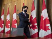 Prime Minister Justin Trudeau leaves a news conference in Ottawa, Monday, Dec. 7, 2020.