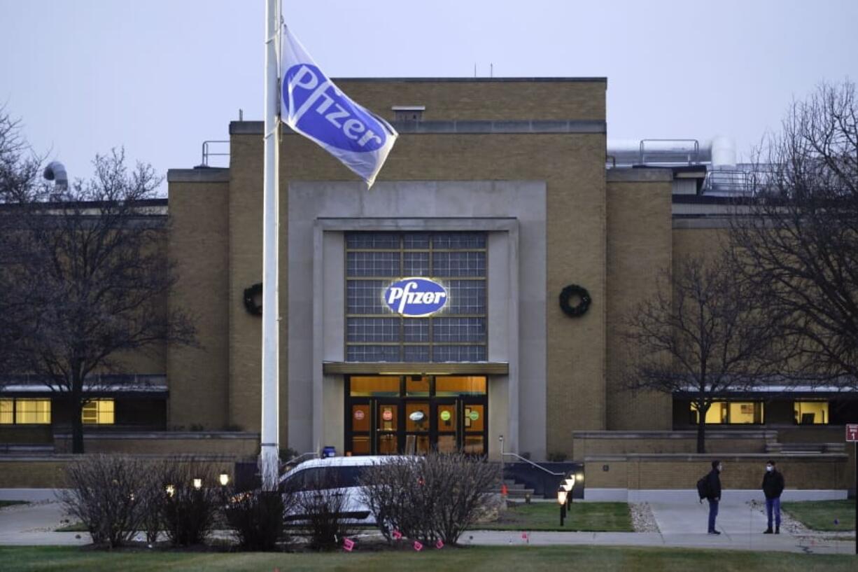 The Pfizer Global Supply Kalamazoo manufacturing plant is shown in Portage, Mich., Friday, Dec. 11, 2020. The U.S. gave the final go-ahead Friday to the nation&#039;s first COVID-19 vaccine, marking what could be the beginning of the end of an outbreak that has killed nearly 300,000 Americans.