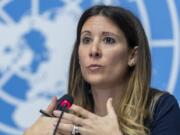 FILE - In this Wednesday, Jan. 29, 2020 file photo, Maria van Kerkhove, head of the Outbreak Investigation Task Force for the World Health Organization speaks during a news conference at the European headquarters of the United Nations in Geneva, Switzerland. The World Health Organization on Monday Dec. 7, 2020 had an unwelcome but potentially life-saving message for the holiday season: Don&#039;t hug. Maria Van Kerkhove, WHO&#039;s technical lead on COVID-19, said most transmission happens among people who tend to spend a lot of time together sharing meals and indoor spaces, in workplaces or homes.