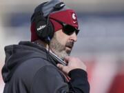 Washington State head coach Nick Rolovich looks on during the first half of an NCAA college football game against Utah, Saturday, Dec. 19, 2020, in Salt Lake City.