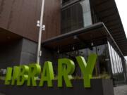 Branches of Fort Vancouver Regional Libraries, including the one in downtown Vancouver shown here, are accepting returns, as well as checking out books via curbside pickup.