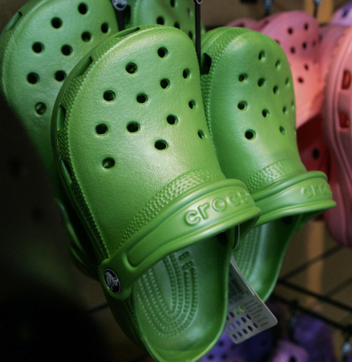 Crocs colorful resin footwear are on display at the REI flagship store in Denver.