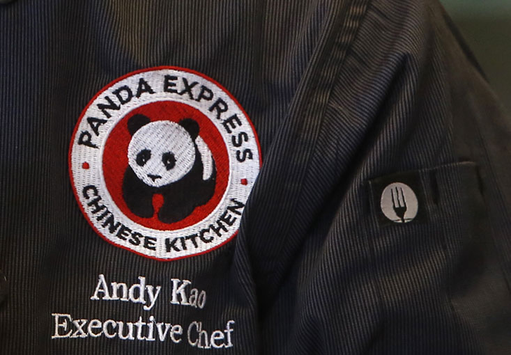 Andy Kao, executive chef at Panda Express, tastes a meatball recipe at the company's Express Innovation Kitchen in Pasadena, Calif.