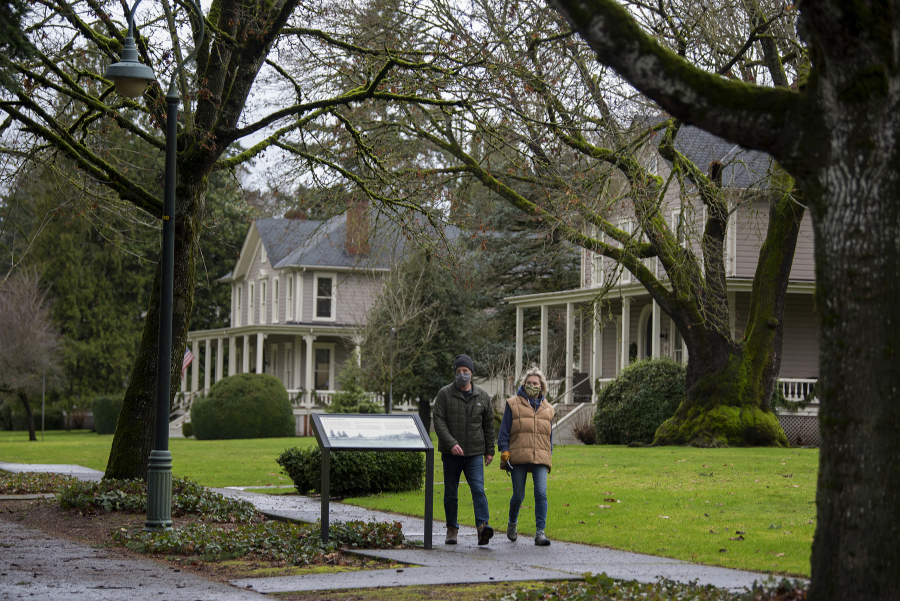 John and Trish McDermott of Vancouver walk along Officers Row.