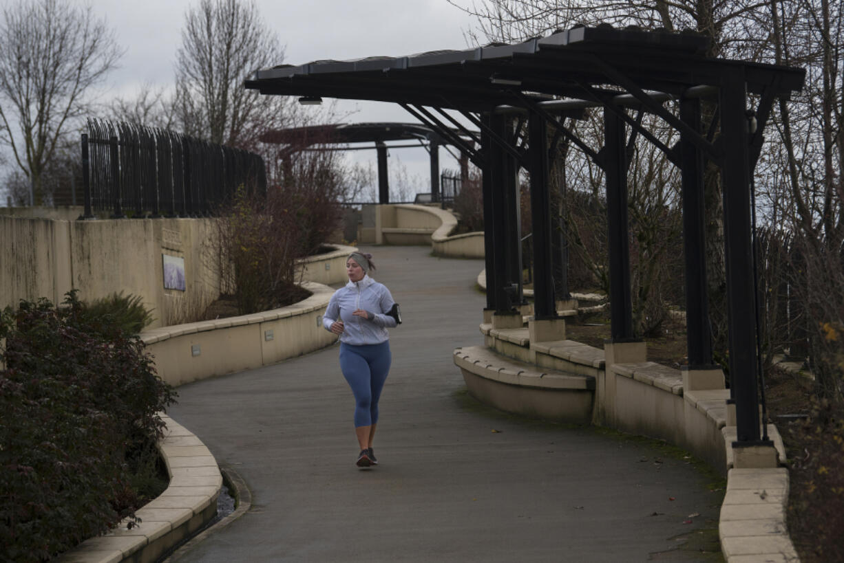 Becky Gross of Vancouver keeps the pace while crossing the Vancouver Land Bridge near Fort Vancouver National Historic Site. Vancouver Parks and Recreation launched a free, socially distanced program that consists of new activities every week, including a tour of Fort Vancouver.