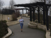 Becky Gross of Vancouver keeps the pace while crossing the Vancouver Land Bridge near Fort Vancouver National Historic Site. Vancouver Parks and Recreation launched a free, socially distanced program that consists of new activities every week, including a tour of Fort Vancouver.