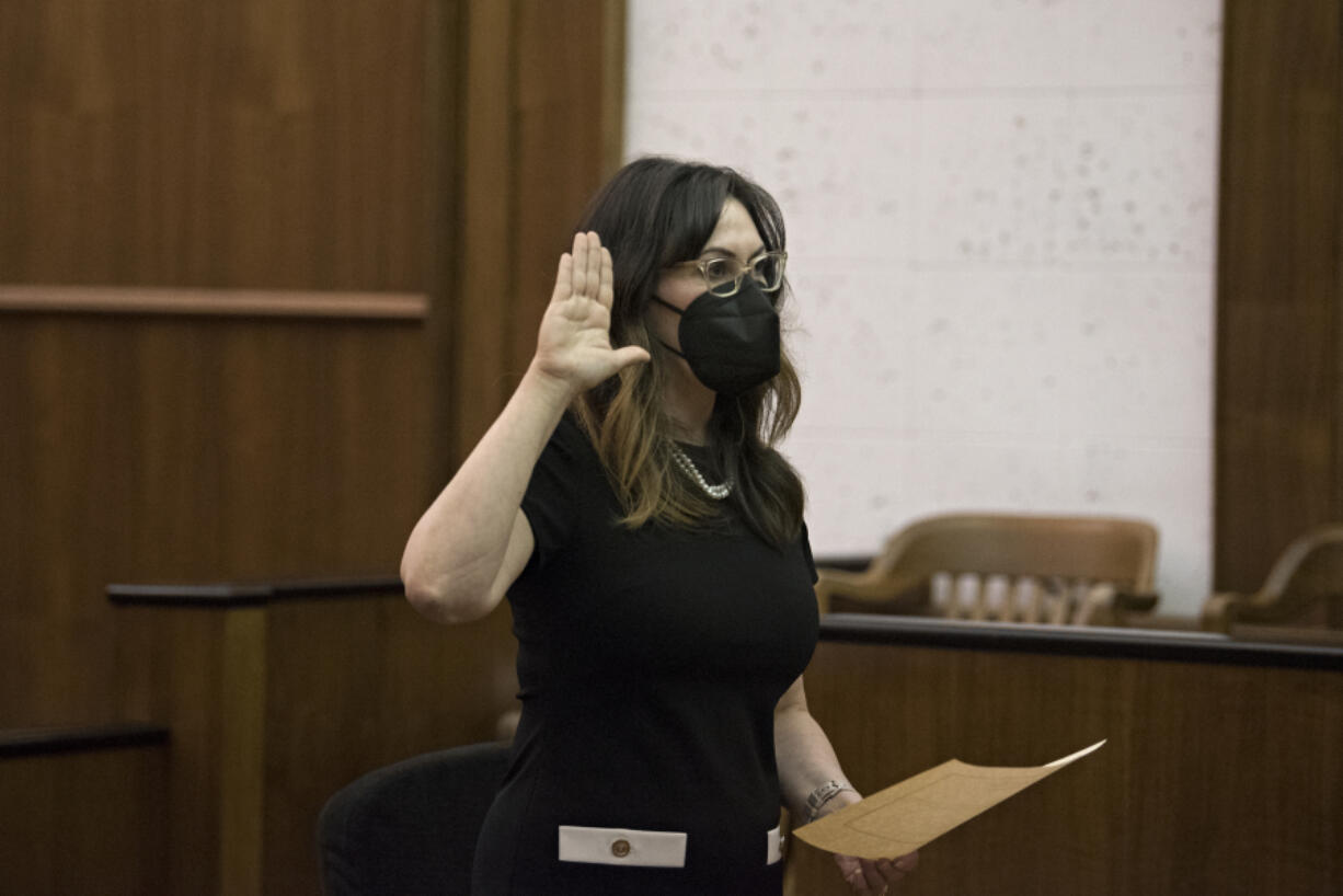 Emily Sheldrick is sworn in as a Clark County Superior Court judge on Friday at the Clark County Courthouse.