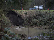 Stormy winter weather caused a small landslide Wednesday about a half-mile southeast of Daybreak Bridge in the 24700 block of Northeast 92nd Avenue in Battle Ground. Clark County Public Works crews planned to close Northeast Manley Road near where it becomes 92nd Avenue.