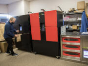 Mike Wallace, co-founder and CEO of Perfect Company, demonstrates a touchless food pickup cabinet at Perfect&#039;s downtown Vancouver lab space.