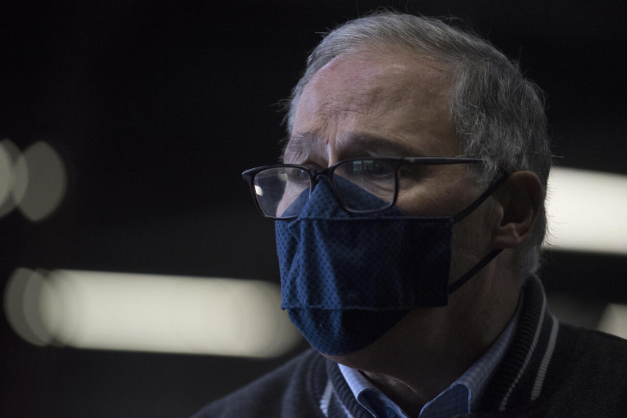 Gov. Jay Inslee speaks with members of the media at the Clark County Fairgrounds on Thursday morning, January 28, 2021.