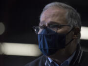 Gov. Jay Inslee speaks with members of the media at the Clark County Fairgrounds on Thursday morning, January 28, 2021.