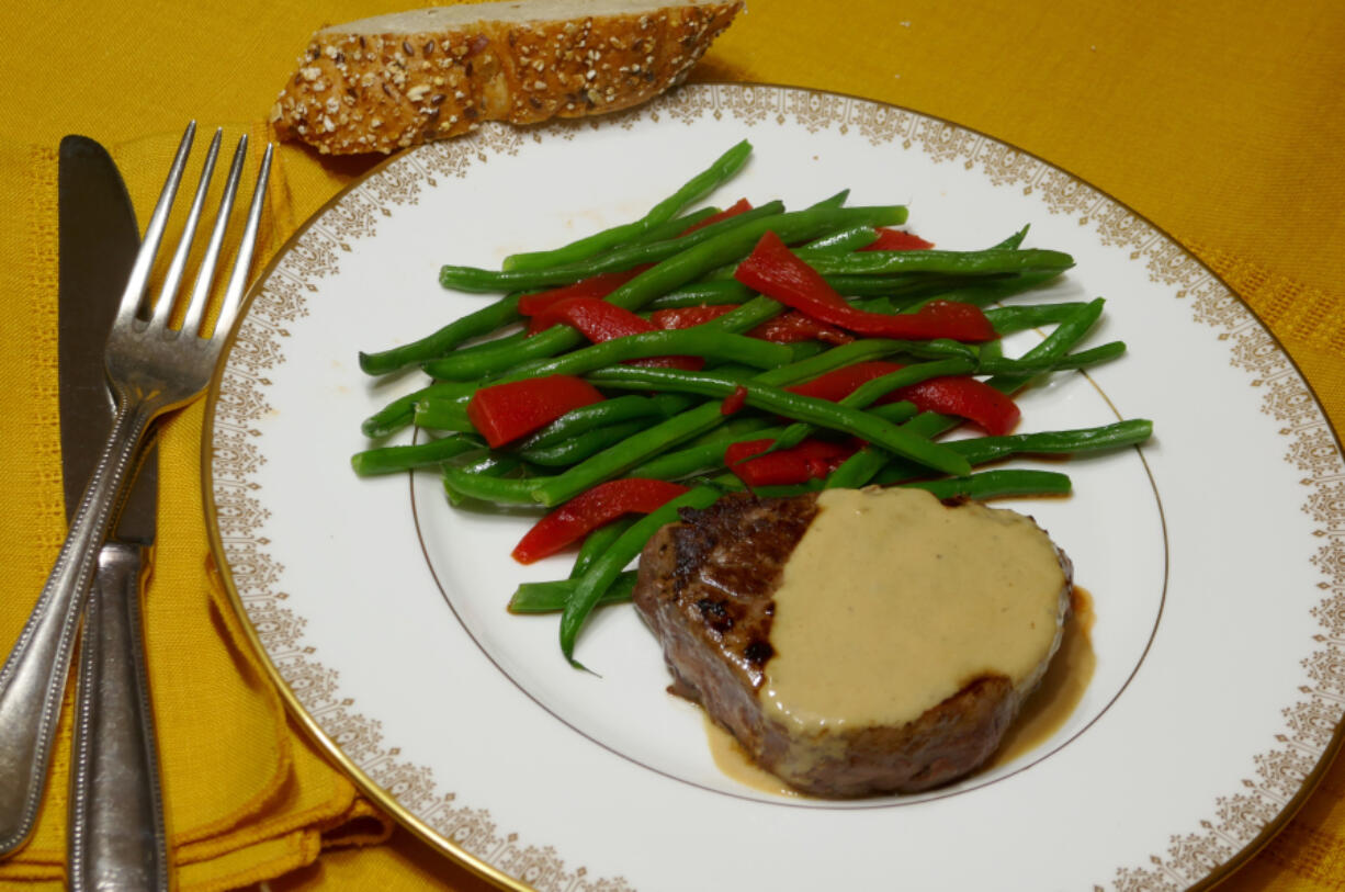 Beef tenderloin in cognac sauce with French green beans.