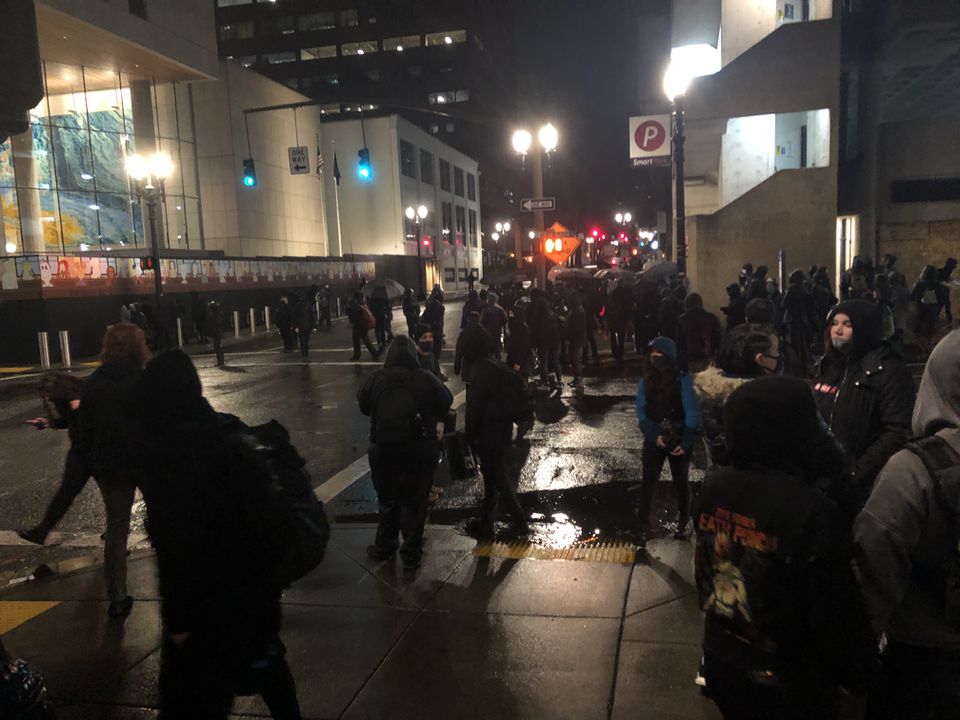 Protesters briefly gathered Wednesday night outside the Multnomah County  Courthouse as part of a demonstration against the storming of the U.S.