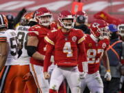 Kansas City Chiefs quarterback Chad Henne celebrates after a run during the second half of an NFL divisional round football game against the Cleveland Browns, Sunday, Jan. 17, 2021, in Kansas City.