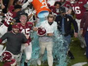 Alabama senior Thomas Fletcher (45) celebrates as head coach Nick Saban is soaked in Gatorade after their win against Ohio State in the College Football Playoff national championship game Jan. 11 in Miami Gardens, Fla. Fletcher, whose 55 career starts were the most on Alabama, was named the winner of the Patrick Mannelly Award, given to the nation&#039;s top collegiate long snapper.