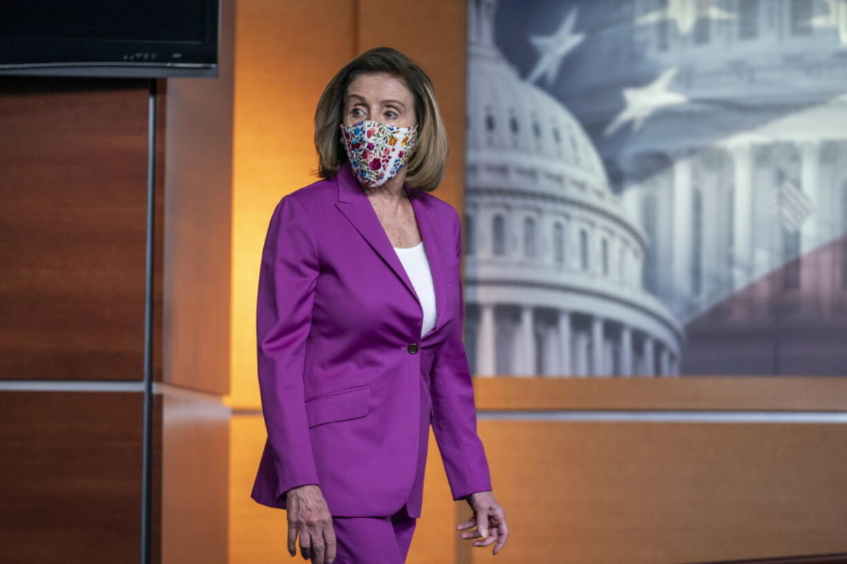 Speaker of the House Nancy Pelosi, D-Calif., holds a news conference on the day after violent protesters loyal to President Donald Trump stormed the U.S. Congress, at the Capitol in Washington, Thursday, Jan. 7, 2021. (AP Photo/J.