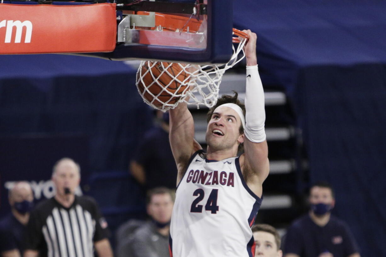 Gonzaga forward Corey Kispert dunks during the second half of an NCAA college basketball game against BYU in Spokane, Wash., Thursday, Jan. 7, 2021.