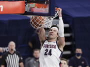 Gonzaga forward Corey Kispert dunks during the second half of an NCAA college basketball game against BYU in Spokane, Wash., Thursday, Jan. 7, 2021.