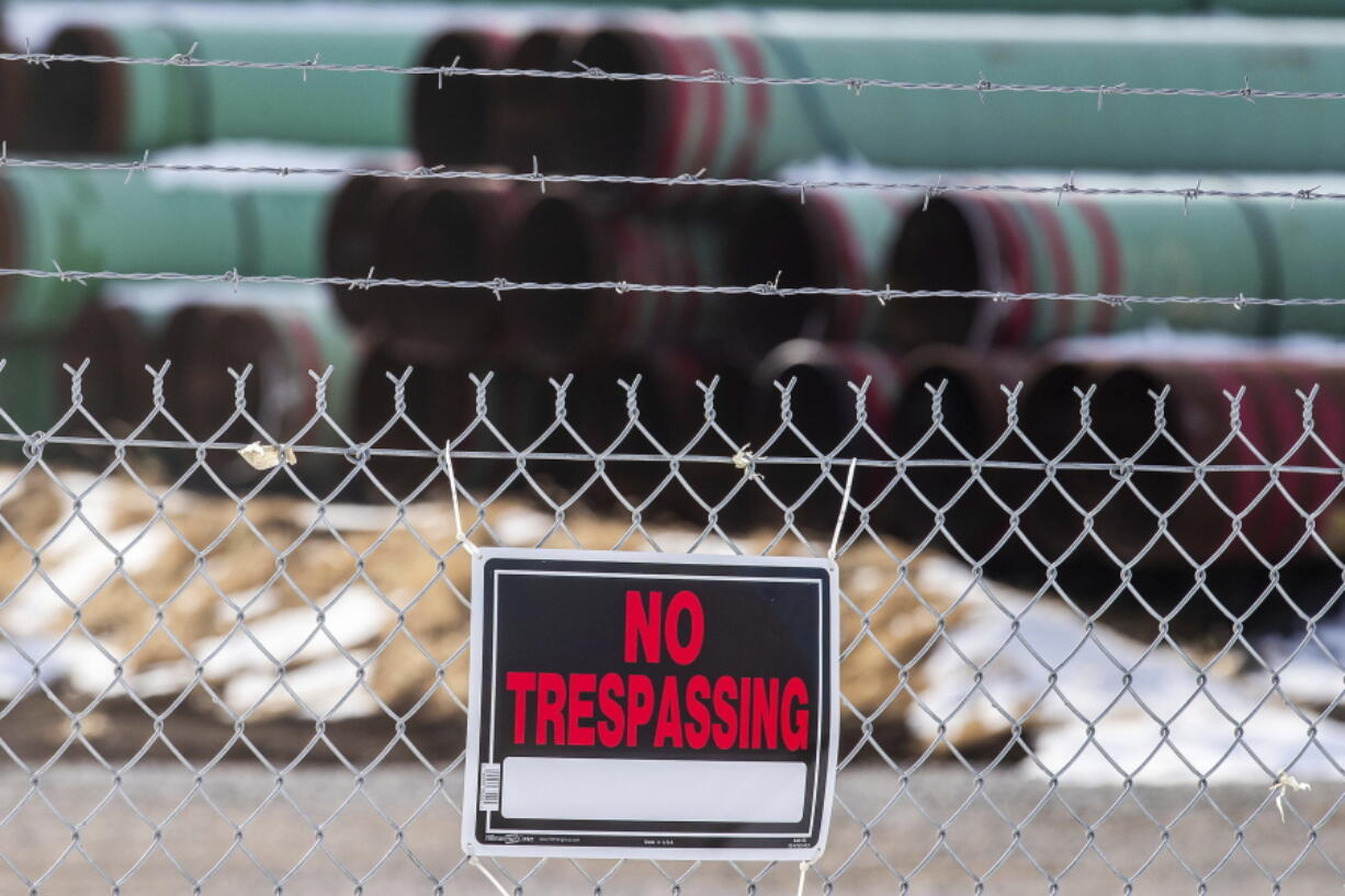 In this Dec. 18, 2020 photo, pipes to be used for the Keystone XL pipeline are stored in a field near Dorchester, Neb. Experts say President Joe Biden&#039;s pledge to undo his predecessor&#039;s anti-regulatory policies on the environment won&#039;t be accomplished easily, despite a fast start. After taking office last week, Biden returned the U.S. to the Paris climate accords, revoked the Keystone oil pipeline&#039;s federal permit and halted oil and gas leasing in the Arctic National Wildlife Refuge.