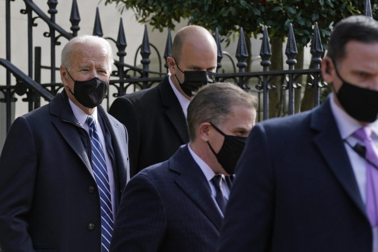 President Joe Biden departs after attending mass at Holy Trinity Catholic Church, Sunday, Jan. 24, 2021, in the Georgetown neighborhood of Washington.