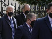 President Joe Biden departs after attending mass at Holy Trinity Catholic Church, Sunday, Jan. 24, 2021, in the Georgetown neighborhood of Washington.