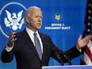 President-elect Joe Biden speaks during an event at The Queen theater in Wilmington, Del., Thursday, Jan. 7, 2021, to announce key nominees for the Justice Department.