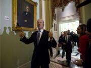 FILE - In this Dec. 31, 2012, file photo Vice President Joe Biden gives two thumbs up following a Senate Democratic caucus meeting about the fiscal cliff on Capitol Hill in Washington.