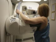 A woman gets a mammogram at the University of Michigan Cancer Center in Ann Arbor, Mich. (Kimberly P.