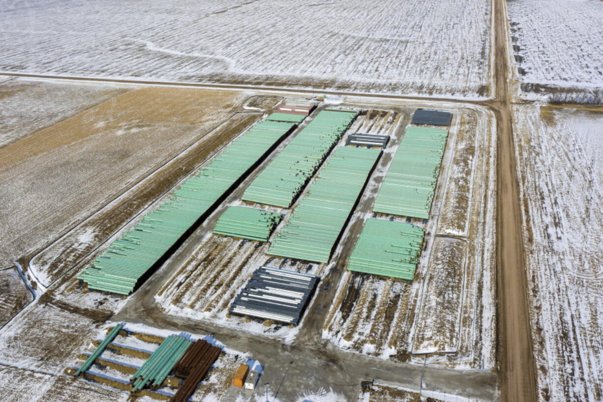 In this Dec. 18, 2020 photo, pipes to be used for the Keystone XL pipeline are stored in a field near Dorchester, Neb.  Canadian Prime Minister Justin Trudeau says his officials have been in frequent contact with President-elect Joe Biden&#039;Aos incoming administration making the case for a long disputed oil pipeline that reports say Biden will cancel on his first day in office.