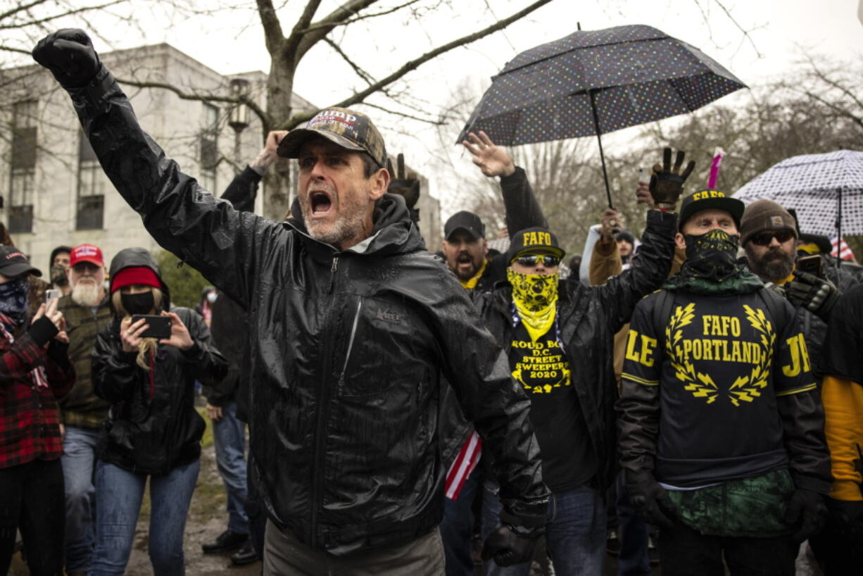 Protesters confront riot police as they gathered at the Capitol on Wednesday, Jan. 6, 2021 in Salem, Ore. Thousands of President Donald Trump&#039;s supporters caused violence and chaos in Washington while Congress attempted to vote to certify that President-elect Joe Biden won the election.