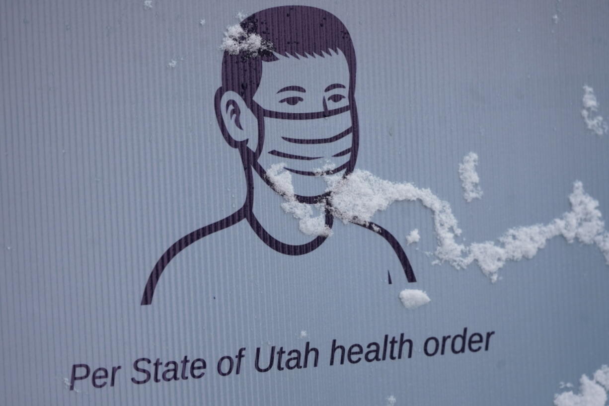 A sign promoting wearing face masks is shown on Main Street in Park City, Utah.