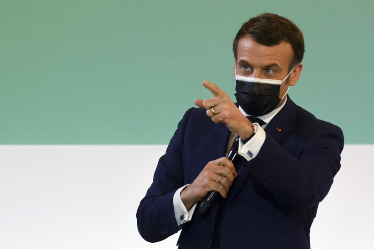 French President Emmanuel Macron gestures as he speaks during the One Planet Summit, at The Elysee Palace, in Paris, Monday Jan. 11, 2021. Protecting the world&#039;s biodiversity is on the agenda for world leaders at the One Planet Summit, which was being held by videoconference due to the coronavirus pandemic.