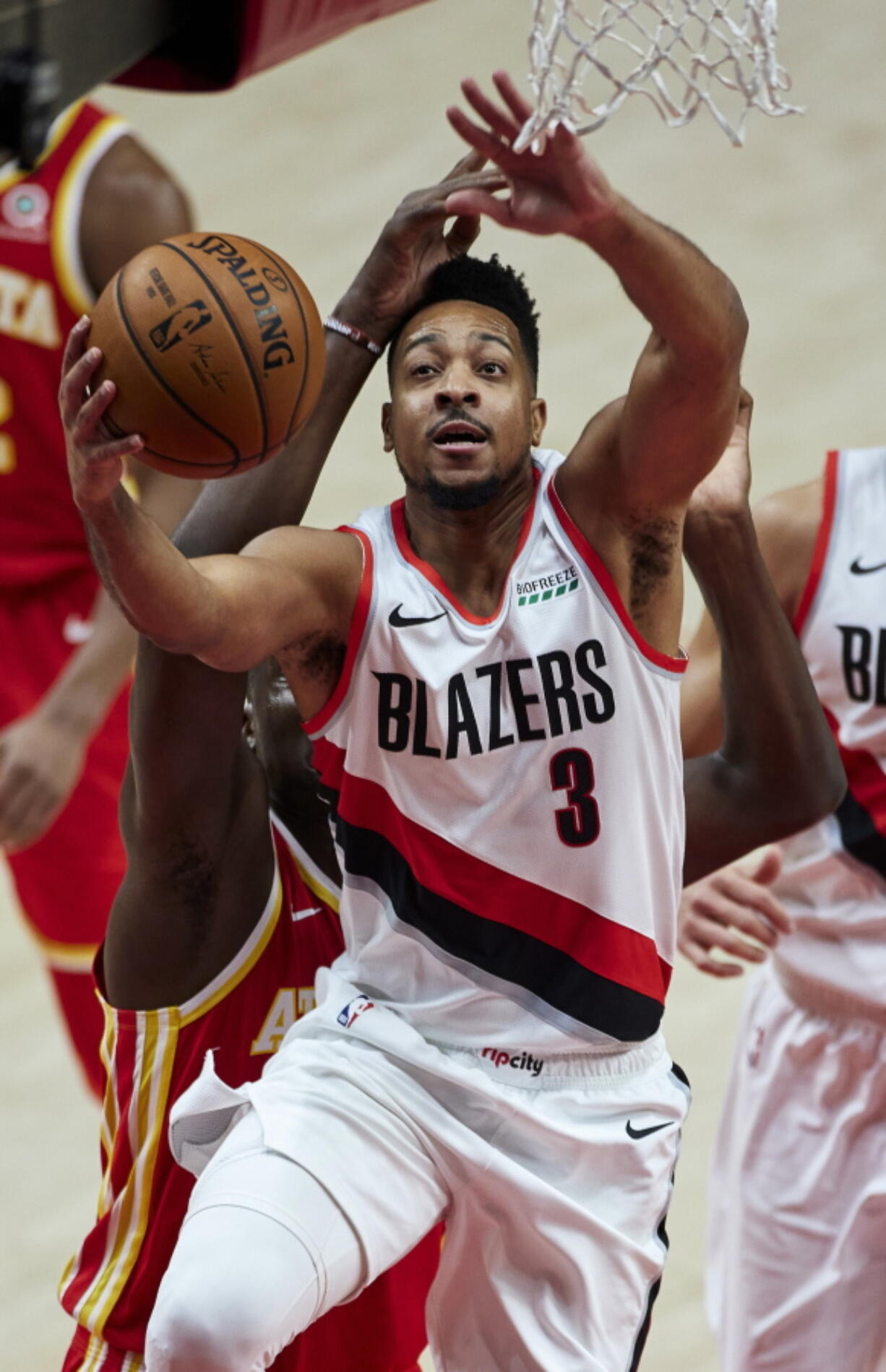 Portland Trail Blazers guard CJ McCollum shoots against the Atlanta Hawks during the first half of an NBA basketball game in Portland, Ore., Saturday, Jan. 16, 2021.