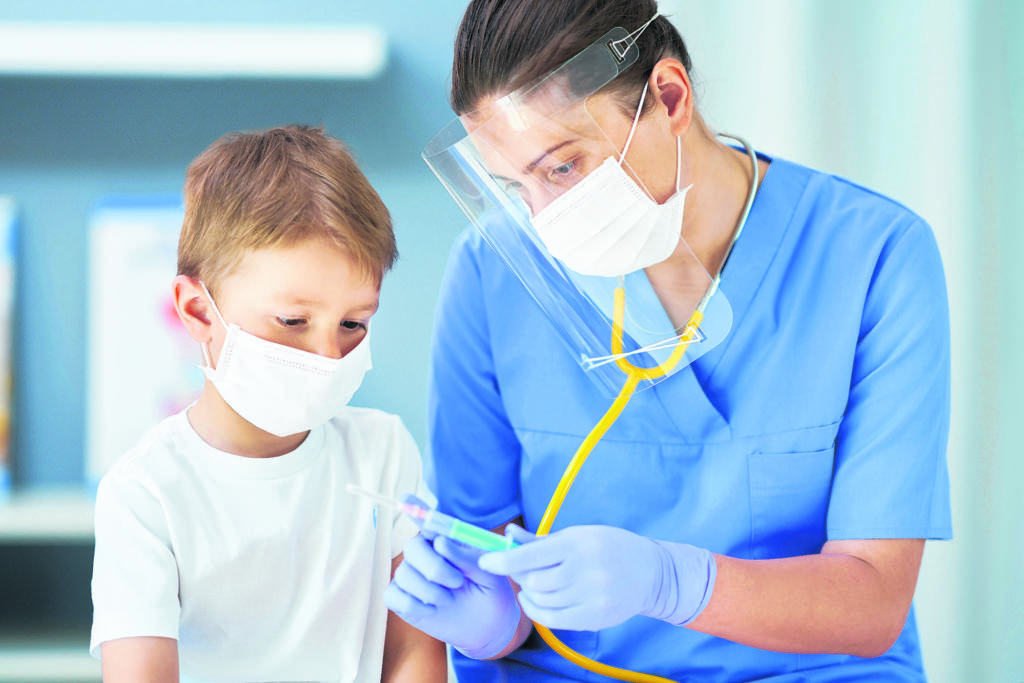 Picture of adorable little boy having doctor's appointment