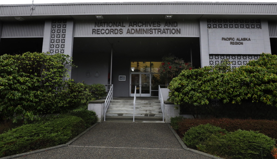 This Jan. 23, 2020, photo shows the National Archives on Sand Point, Wash., that has about a million boxes of generally unique, original source documents and public records. More than two dozen Native American tribes and cultural groups from the Northwest and Alaska are suing the federal government to stop the sale of the National Archives building in Seattle, a plan that would force the relocation of millions of invaluable historical records to California and Missouri.